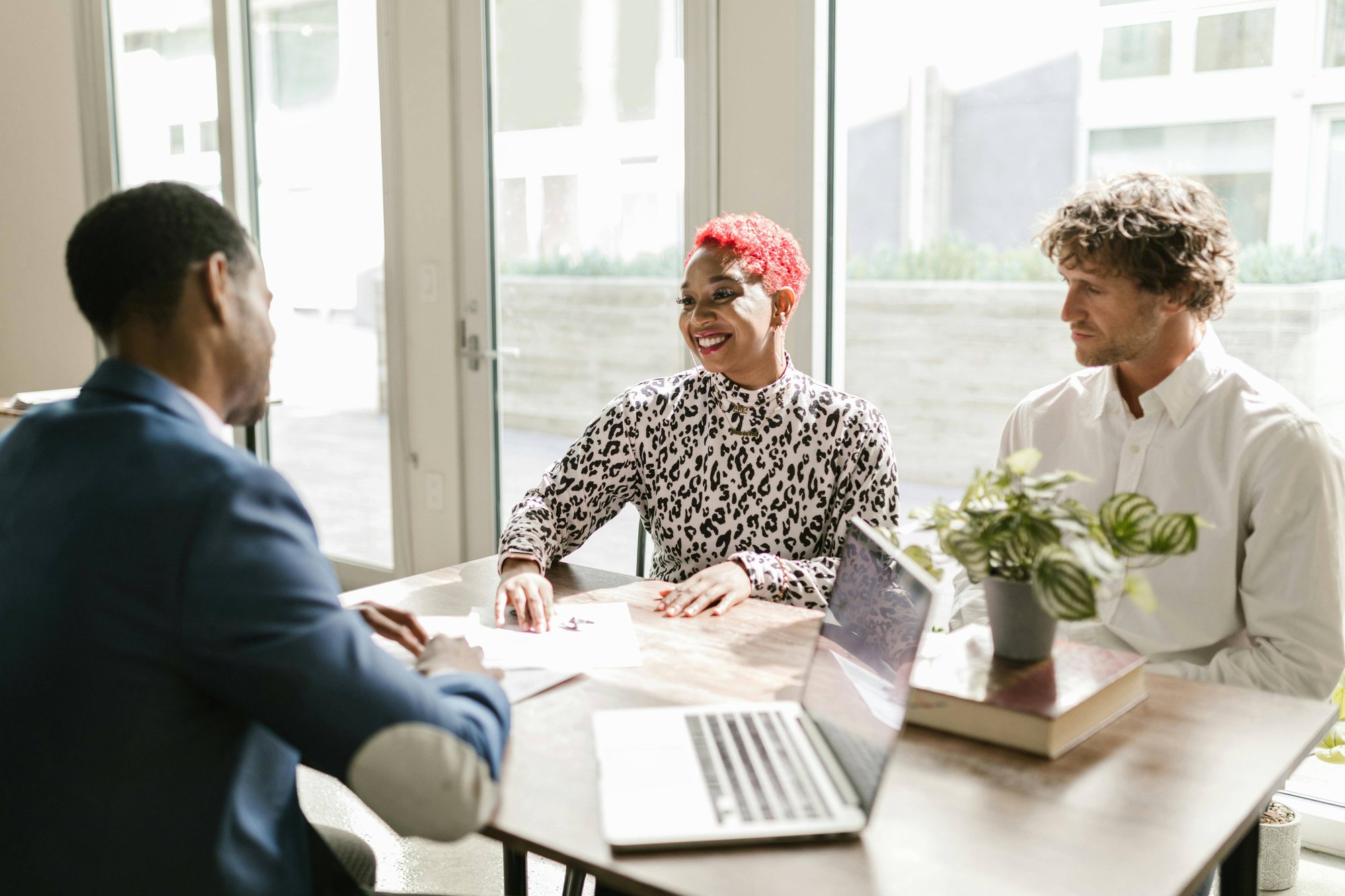 A couple meeting with a CPA about their retirement goals